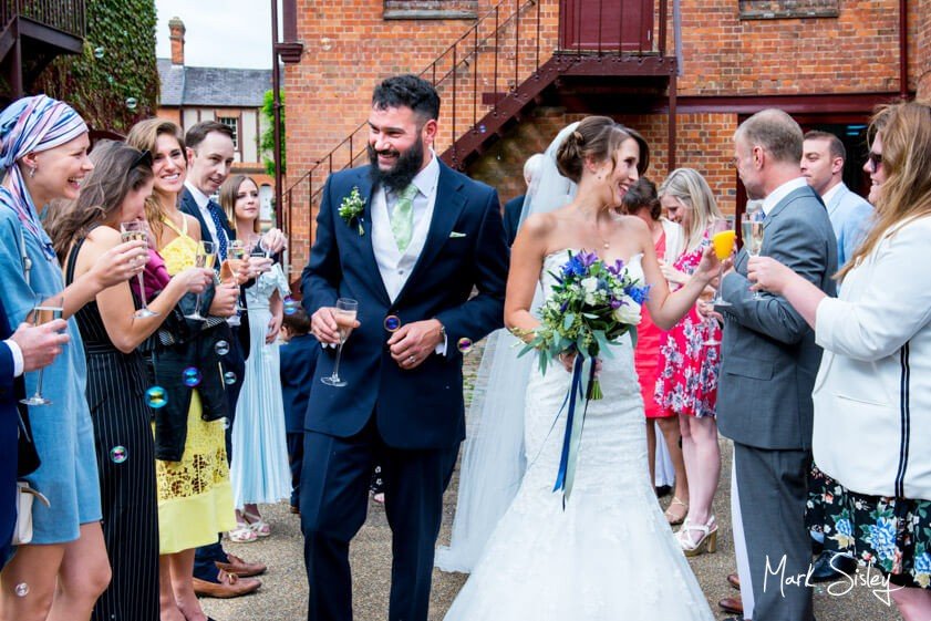 Bride and groom and wedding guests - wedding at Five Arrows Waddesdon - Mark Sisley Photography