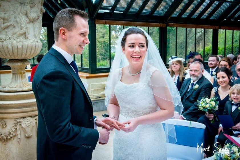 Bride and groom and wedding guests - wedding at The Dairy Waddesdon Manor - Mark Sisley Photography