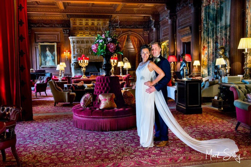 Bride and groom in the great hall - wedding at Cliveden House - Mark Sisley Photography