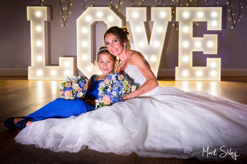 bride and bridesmaid - wedding at Monkton Barn - Mark Sisley Photography