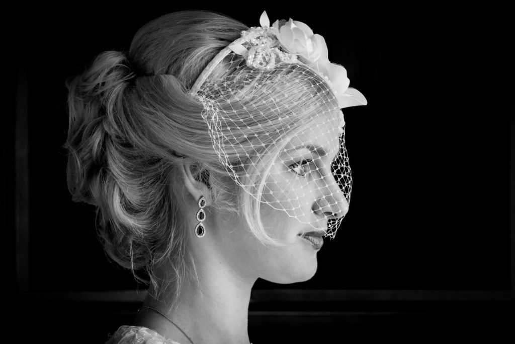 Brocket Hall dramatic wedding photographs of the bride before the ceremony