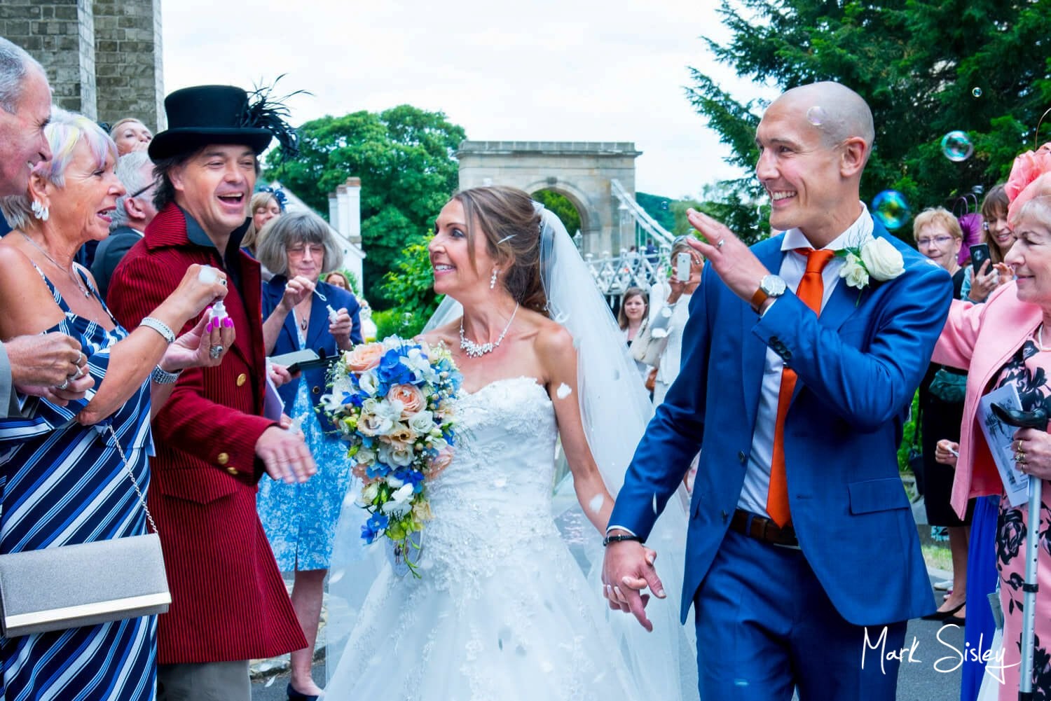 All Saints Church Marlow Confetti aisle with famous Marlow Bridge behind