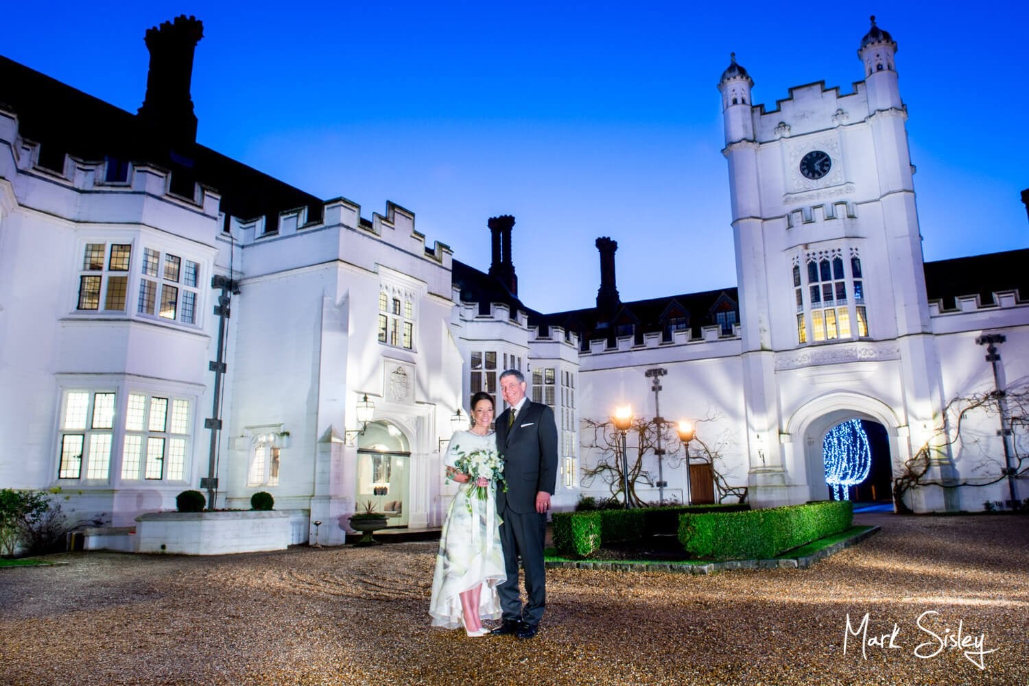 Danesfield House wedding photography at dusk in the entrance courtyard