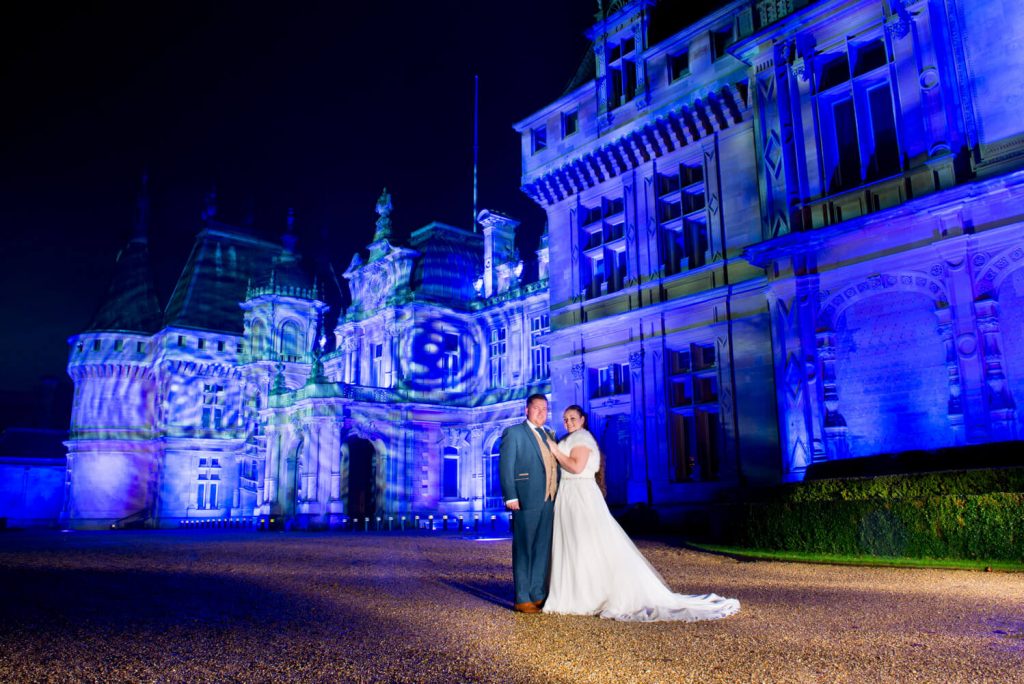 Waddesdon Dairy winter wedding photograph with the Christmas illuminations at the manor