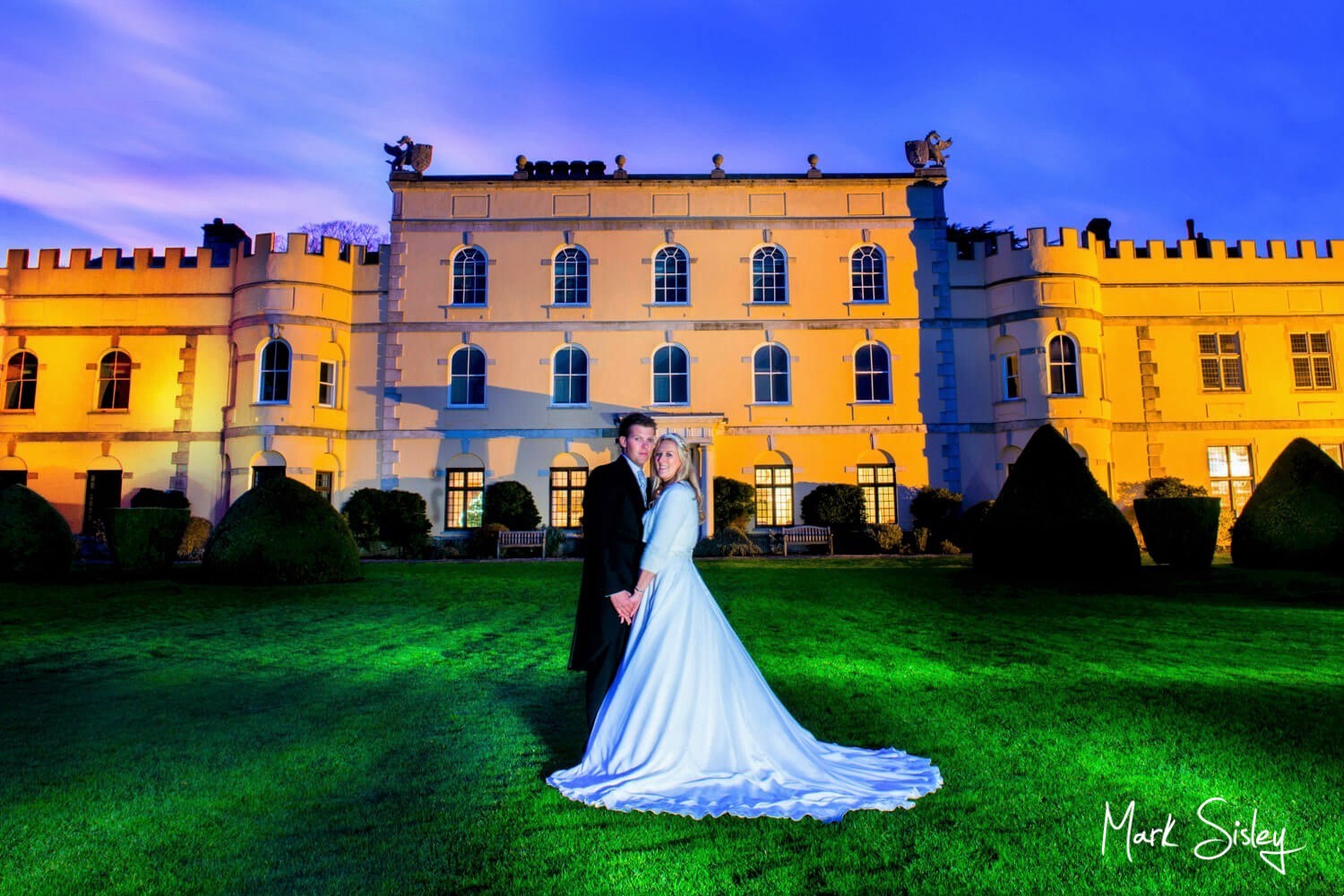 Hampden House wedding photography captured at dusk in the main gardens