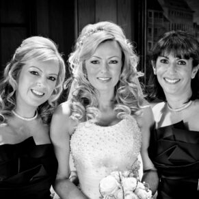 Black and white image of bride and bridesmaids at The Dairy Waddesdon