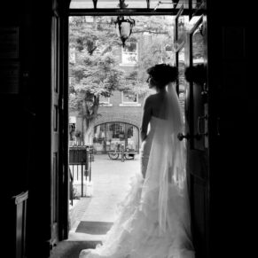 Black and white wedding photography in Buckinghamshire - silhouette portrait of bride at Sir Christopher Wren House Hotel