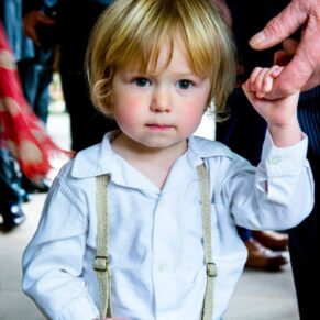 Buckinghamshire wedding photography of children - this adorable shot was captured at the Dairy on the Waddesdon Estate