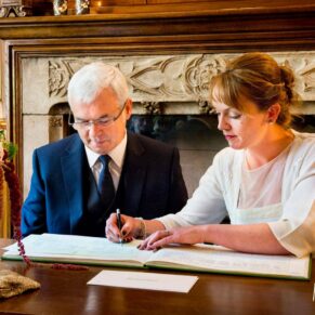 Signing of the register at Covent Garden Hotel wedding
