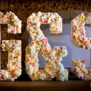 Buckinghamshire wedding detail photography - giant floral letters at Missenden Abbey