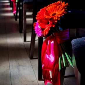 Detail of floral arrangement of gerberas at Stoke Place wedding