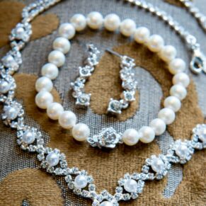 Detail of jewellery at Stoke Place wedding
