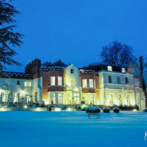 Winter twilight wedding photography of Taplow House Hotel in the snow