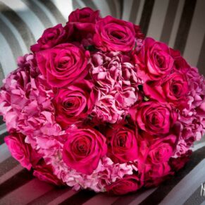 Pink roses in bridal bouquet at Taplow House Hotel wedding