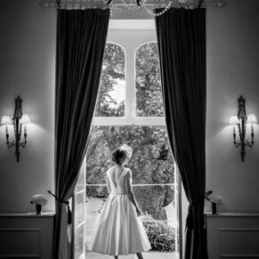 Black and white window-lit bridal photography at Taplow House Hotel wedding