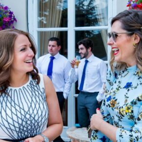 Fun informal image of wedding guests at Taplow House Hotel wedding