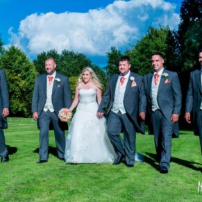 Bridal party on lawn at Taplow House wedding
