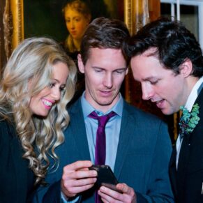 Fun informal image of wedding guests at Hampden House winter wedding