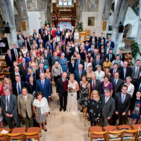 St. Mary's Church Chesham wedding group pose of all the guests from the balcolny
