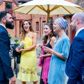 Five Arrows Hotel Waddesdon wedding photography of the guests chatting in the grounds