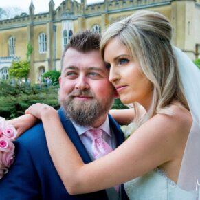 Summer's day wedding at Missenden Abbey - the newlyweds pose for the camera