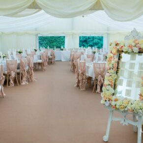 Summer's day wedding marquee interiors at Missenden Abbey prior to the meal