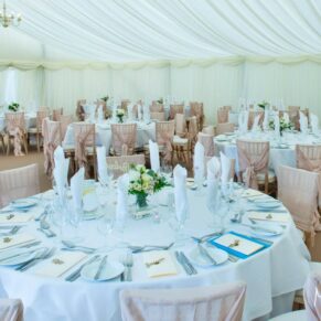 Summer's day wedding marquee interiors at Missenden Abbey