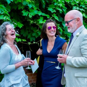 Dairy Waddesdon summer wedding guests enjoying the banter