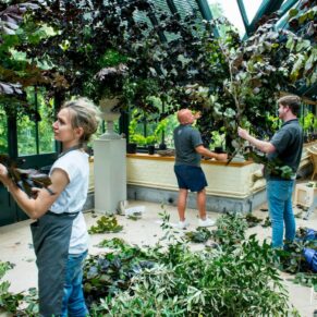 Dairy Waddesdon summer wedding florists busy at work