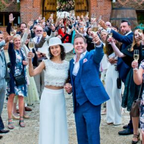 Dairy Waddesdon summer wedding pose of everyone with the champagne glasses