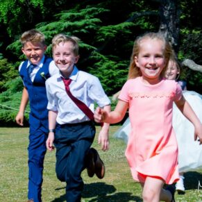 Missenden Abbey wedding images of the children running with smiley faces