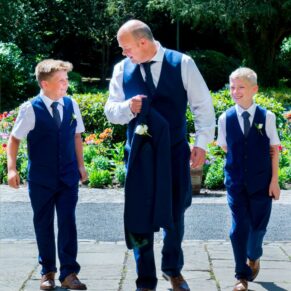 Missenden Abbey wedding images of the lads arriving at the entrance doorway