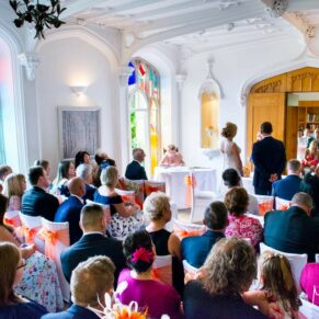 Missenden Abbey wedding photos of the ceremony in full swing in the Garden Room