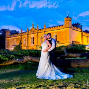 Missenden Abbey wedding photos of the newlyweds at dusk under the cedar tree