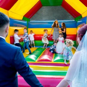 Missenden Abbey wedding celebration - the children just loved this bouncy castle