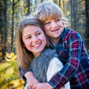 Amersham and Beaconsfield autumn portraits capturing these two adorable children in Penn Woods