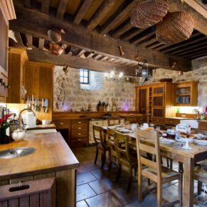 Holiday Homes photography in the UK and France - Chateau Bramatourte interiors showcasing the grand kitchen