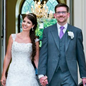 Clearwell Castle - St. Peter's Church wedding photography of the newlweds leaving the ceremony