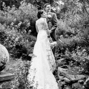 Clearwell Castle black and white wedding image of the bride in the grounds