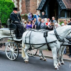 St. Peter's Church wedding photography of the newlweds waiting to depart for the reception