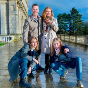 Cliveden House Buckinghamshire portrait photography of a family of four under beautiful blue skies