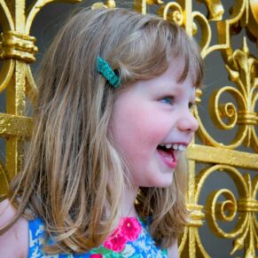 Cliveden House Buckinghamshire portrait photography of young girl by the gilded gates
