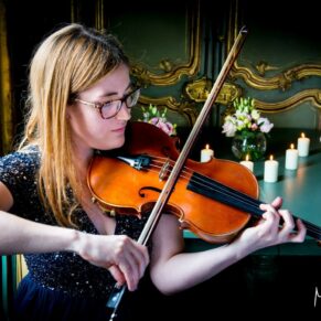Cliveden House wedding image of the violinist performing in the French Dining Room