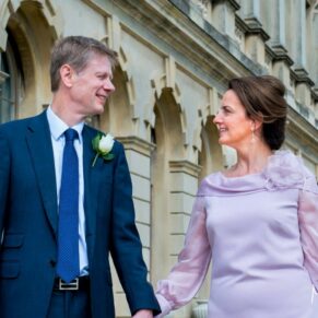 The newlyweds taking a stroll at their Cliveden House wedding