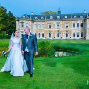 Hartwell House wedding photography of the newlyweds enjoying a few quiet moments in the gardens