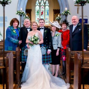 Group shot photography inside on a winter's day at St. John The Baptist Church in Great Gaddesdon