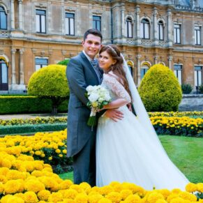The bride and groom at the manor for their Dairy Waddesdon Manor wedding