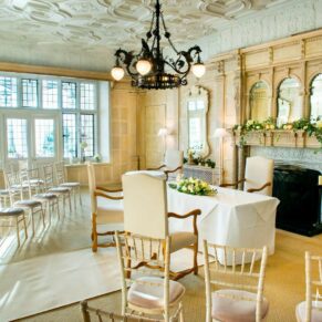 Danesfield House wedding photography of the interior setup in the restaurant for the winter marriage ceremony