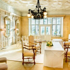 Danesfield House wedding photography of the interior setup in the restaurant for the civil ceremony