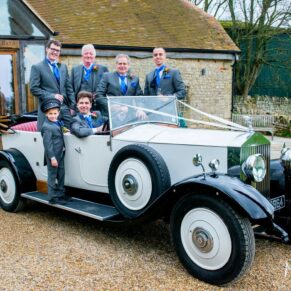 Fun picture of vintage car at Notley Tythe Barn wedding